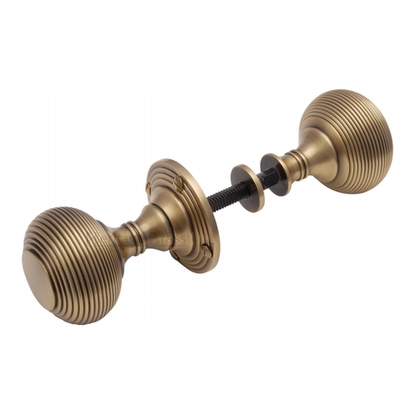 RIM V971-AT • Antique Brass • Heritage Brass Reeded Rim Knobs On Round Roses